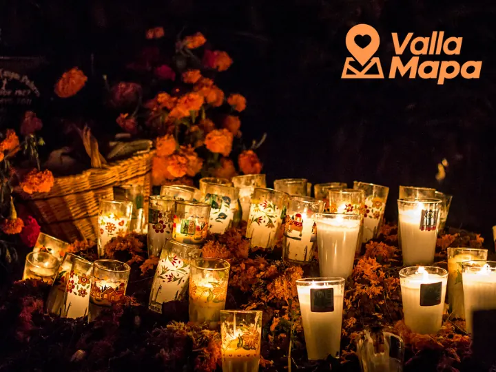 Hanal Pixán altar in Yucatán with candles, flowers and traditional food